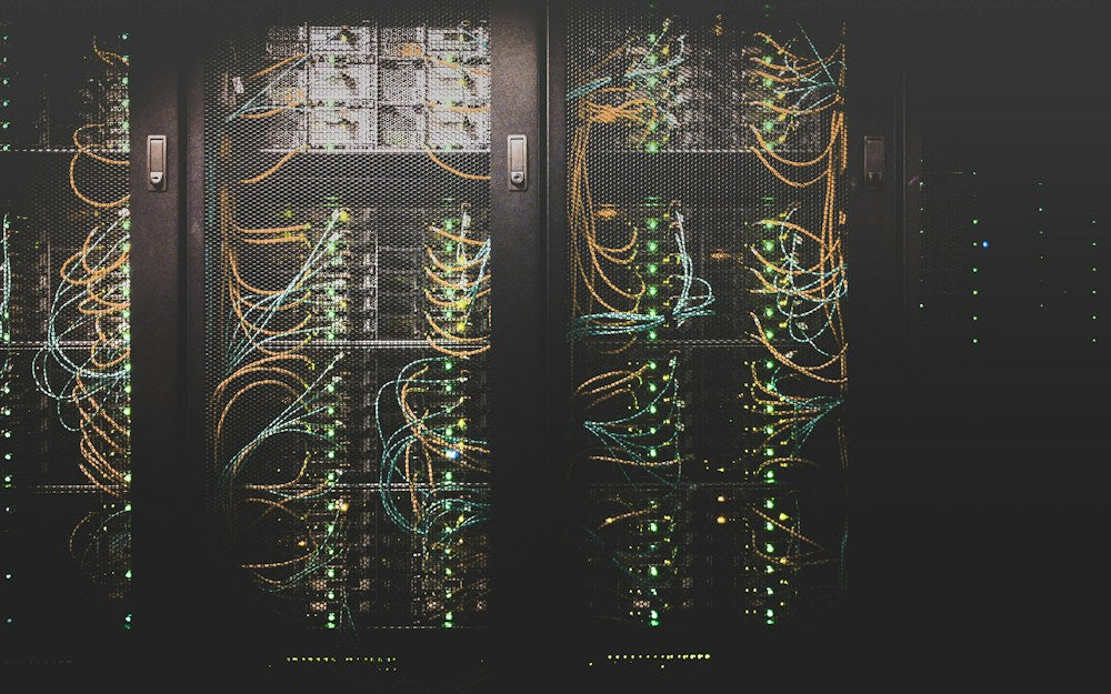 Server racks inside a data center, illustrating the end-use sector